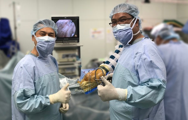 In theatre observing superior capsular reconstruction with Dr Teruhisa Mihata