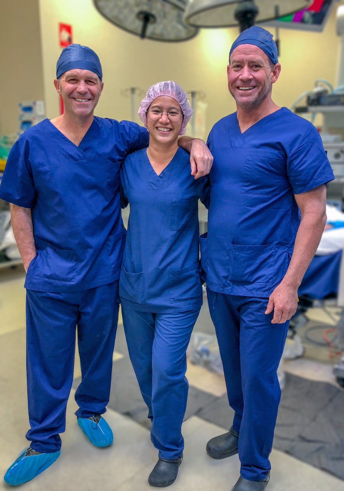 Dr Marc Hirner visiting theatre, with fellow Dr Kristine Italia