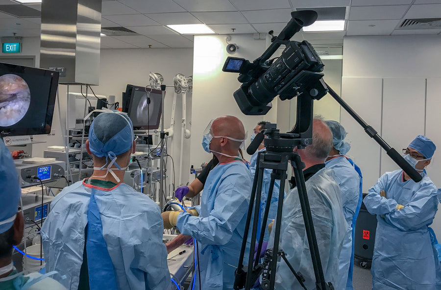 Demonstrating arthroscopic AC joint fixation at the Arthrex lab in Singapore